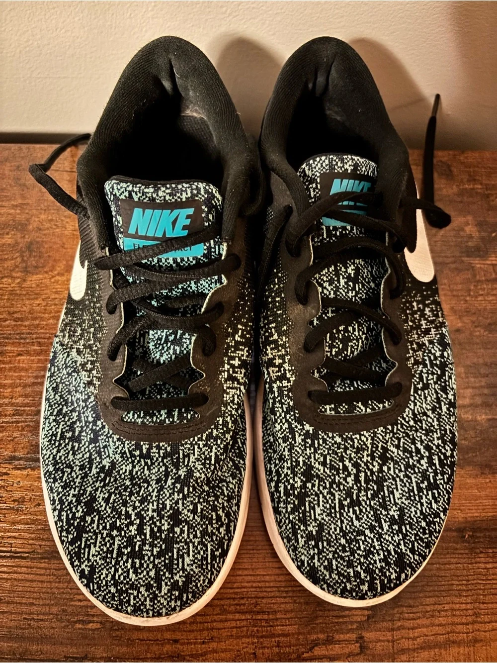 Nike Black Sneakers with Teal Accent
